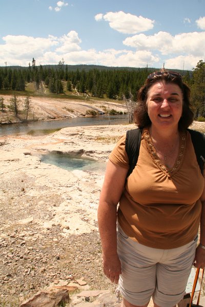 Trip (90).JPG - Sharon in front of Spiteful Geyser at Yellowstone National Park geyser basin